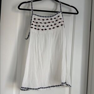 White Sleeveless Top with Embroidered Details